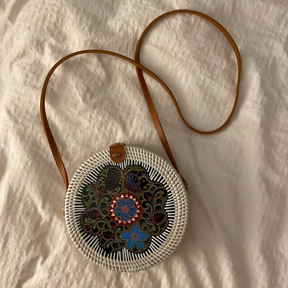 Woven cross body bag with leather strap